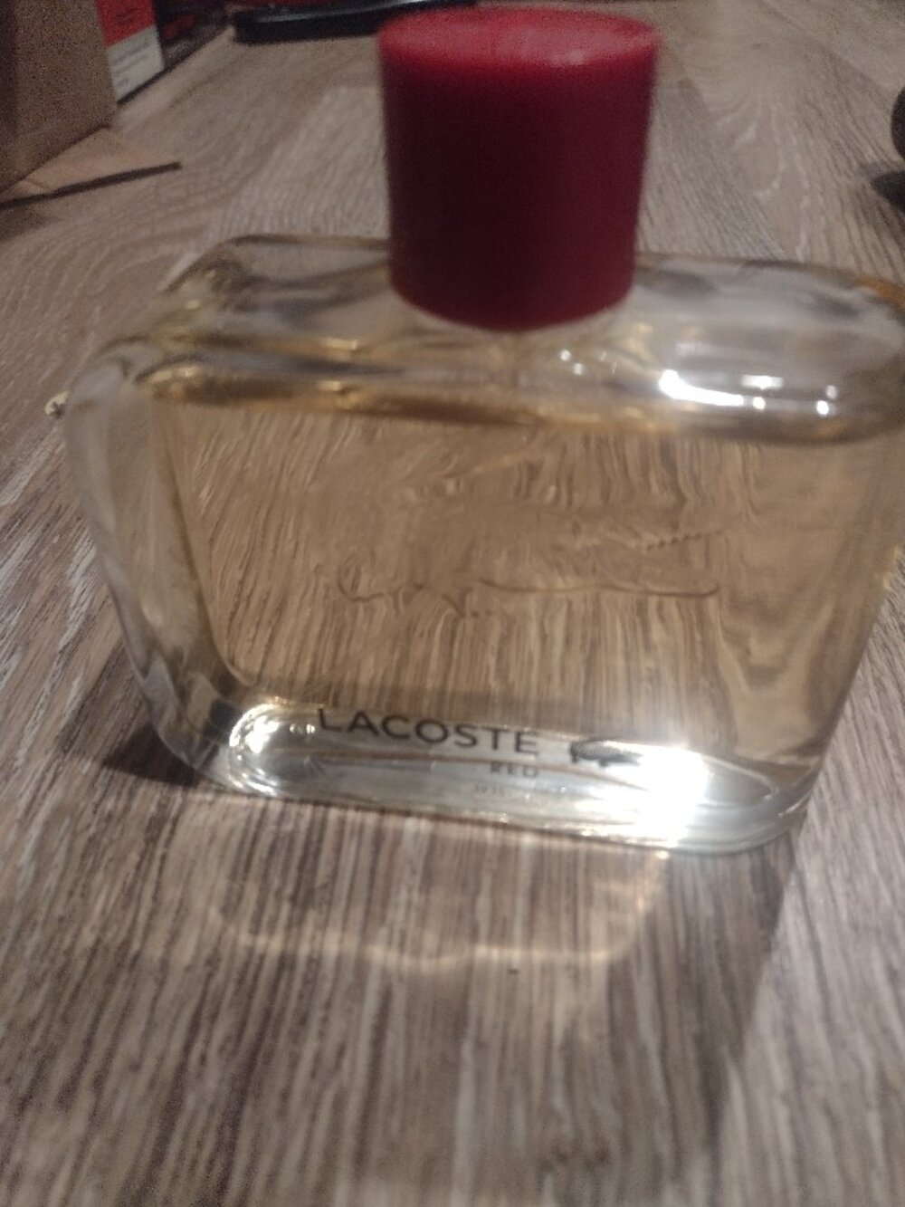 Lacoste Red mens cologne 4.2 fl oz mostly full